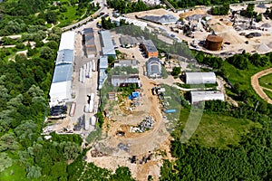 Aerial view of the industrial area with hangars outside the city
