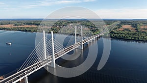 Aerial view industrial bridge traffic transportation crossing pond sea water with ship panorama