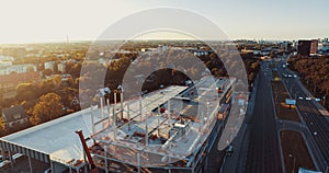 Aerial View of Industrial Commercial Property Building Construction Site. Machinery and Skyscrap