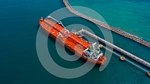 Aerial view industrial crude oil and fuel tanker ship cruising deep ocean sea, Tanker ship vessel unloading at port, Business