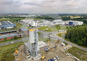 Aerial view of an industrial estate with the construction site f