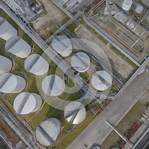 Aerial View of Industrial Fuel Storage Tanks at Twilight in a Complex Facility