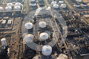 Aerial view industrial park harbor Rotterdam with oil tanks