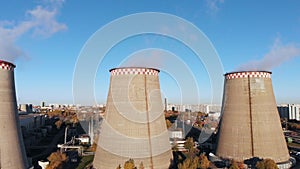 Aerial view of the Industrial Plant with Smoking Pipes near the City. Industrial zone. View from the drone to the