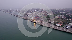 Aerial view of an industrial seaport in northern Italy. Constructions, technologies and infrastructure of a port.