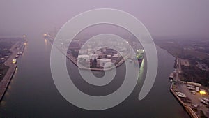 Aerial view of an industrial seaport in northern Italy. Constructions, technologies and infrastructure of a port.