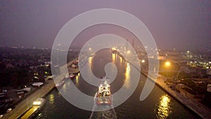 Aerial view of an industrial seaport in northern Italy. Constructions, technologies and infrastructure of a port.