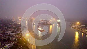 Aerial view of an industrial seaport in northern Italy. Constructions, technologies and infrastructure of a port.