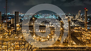 Aerial view industrial view at oil refinery plant form industry zone at night, Refinery plant or petrochemical factory industrial