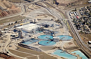 An aerial view industrial water treatment at an open pit copper mine.