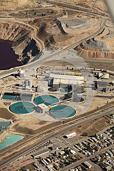 An aerial view industrial water treatment at an open pit copper mine.