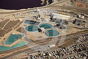 An aerial view industrial water treatment at an open pit copper mine.