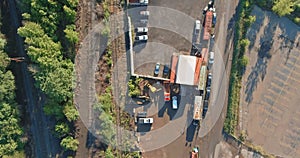 An aerial view of an industrial zone with buildings and a logistics center from the air