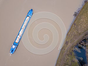 Aerial view of inland cargo river ship