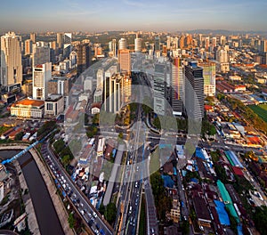 Aerial view of intersection in Kuala Lumpur Downtown, Malaysia. Financial district and business centers in smart urban city in