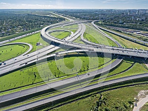 Aerial view at intersections of Western High Speed Diameter WHSD and city ringroad at summer. St. Petersburg, Russia