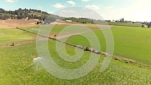 Aerial view of irrigation equipment watering a farmers field.