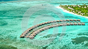 Aerial view of irufushi island with water bungalows, maldives