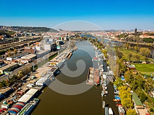 Aerial view of island Cisarska louka - Imperial Meadow in Prague - industrial part of Smichov with dock photo