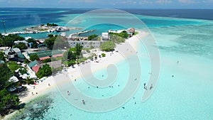 Aerial View of island near Maafushi on Kaafu Atoll. Tropical Island with clear ocean and beach, Maldives