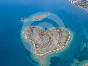 Aerial view of the island in the shape of a heart, Croatia, island of lovers, Otok Galesnnjak, islet, rock. Also called otok za Za