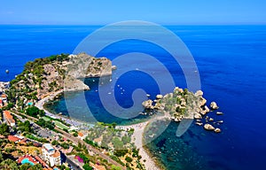 Aerial view of Isola Bella beach coast in Taormina, Sicily photo