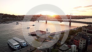 Aerial view of Istanbul at sunset from a drone. Turkey. Cultural centers of Istanbul, bosphorus scenery on golden horn