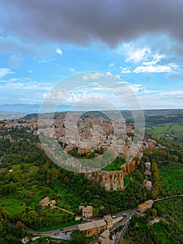 Aerial view of the Italian city of Orvieto, located on a lush green hillside