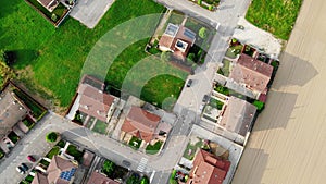 Aerial view with an Italian village located on the bank of a river.