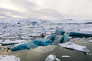 Aerial view of the J kuls rl n glacial lagoon and floating icebergs. The beginning of spring in Iceland