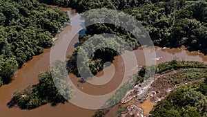 aerial view of the Jacare Pepira River and riparian forest, in a stretch in the city of Bariri, Sao Paulo photo