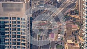 Aerial view of JBR and Dubai Marina skyscrapers and luxury buildings timelapse from above