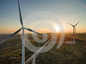 Aerial view of Jelinak windmill farm at sunset.