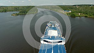 Aerial view journey by passenger ship along the river.