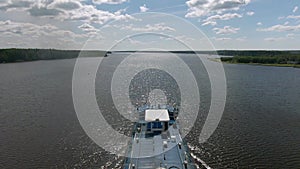 Aerial view journey by passenger ship along the river.