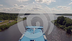 Aerial view journey by passenger ship along the river.