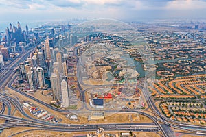 Aerial view of Jumeirah island, Dubai Downtown skyline in United Arab Emirates or UAE. Financial district and business area in