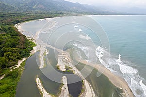 Aerial view between the junction of the river and the sea photo