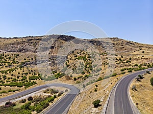 Aerial view of Kahta Sincik Road, close to Katha river near the village of Taslica, Adiyaman Province, Turkey. Winding roads