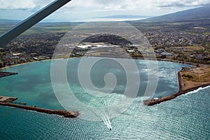 Aerial view of Kahului Harbor beside the town of Kahului on Maui`s eastern coast