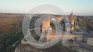 Aerial view of Kamianets-Podilskyi castle in Ukraine at sunrise