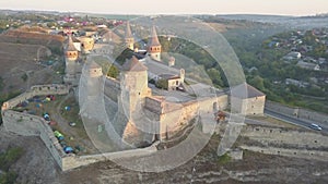 Aerial view of Kamianets-Podilskyi castle in Ukraine at sunrise