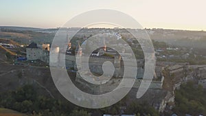 Aerial view of Kamianets-Podilskyi castle in Ukraine at sunrise