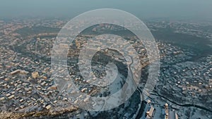 Aerial view of Kamianets-Podilskyi castle in Ukraine in winter. The fortress located among the picturesque nature in the