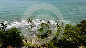 Aerial view of Karang Bolong Beach and Its Wonderful Sunset View. At anyer beach with noise cloud and cityscape. Banten, Indonesia