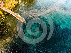 Aerial view of the karst lake named Goluboye Ozero