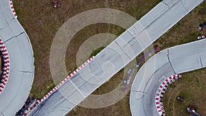 aerial view of the karting track during the race. Several racing karts compete on a special track.