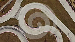 aerial view of the karting track during the race. Several racing karts compete on a special track.