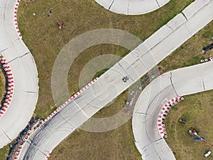 aerial view of the karting track during the race. Several racing karts compete on a special track.
