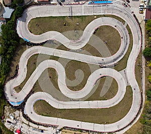 aerial view of the karting track during the race. Several racing karts compete on a special track.